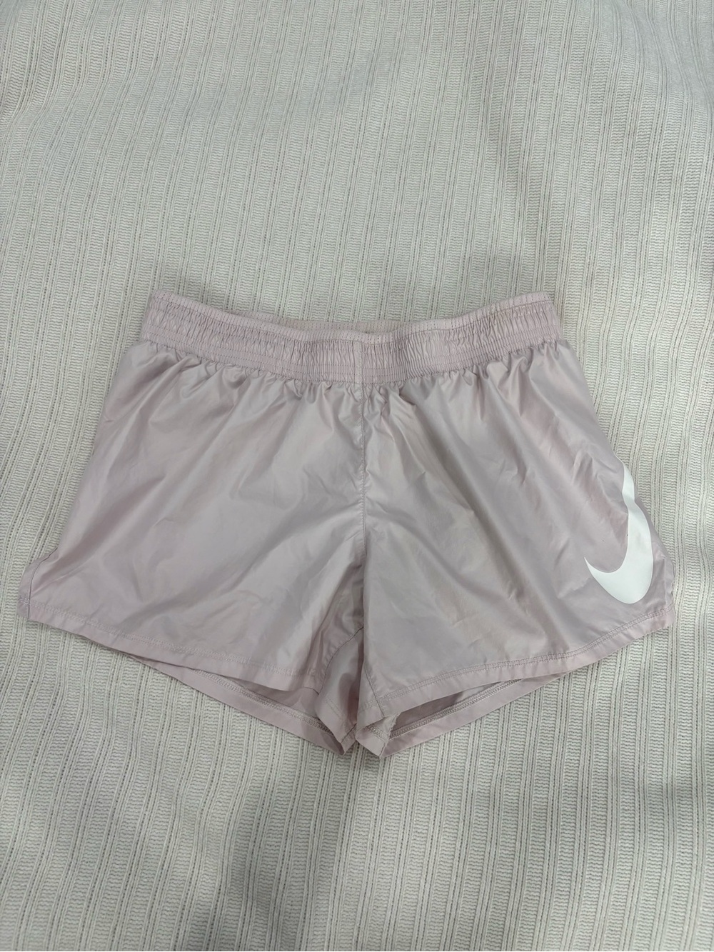 Nike Women’s Pale Pink Athletic Shorts with White Swoosh